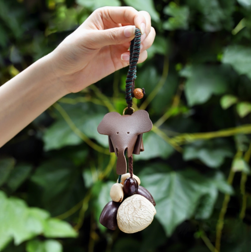 Fruit shell backpack hanging bell