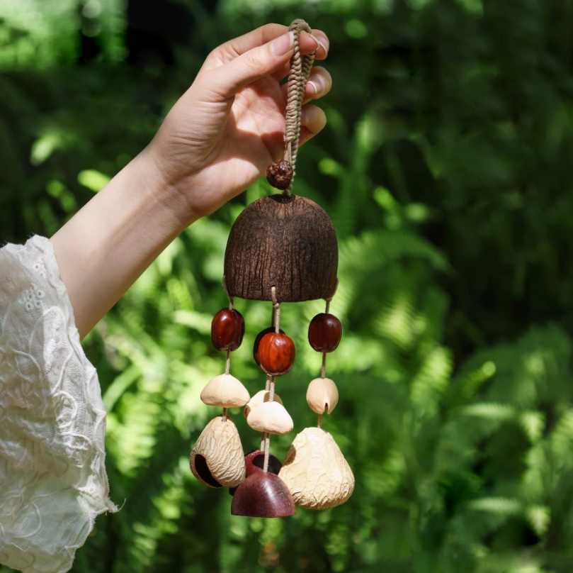 Fruit shell backpack hanging bell